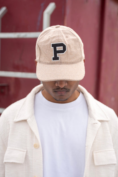 beige cap
